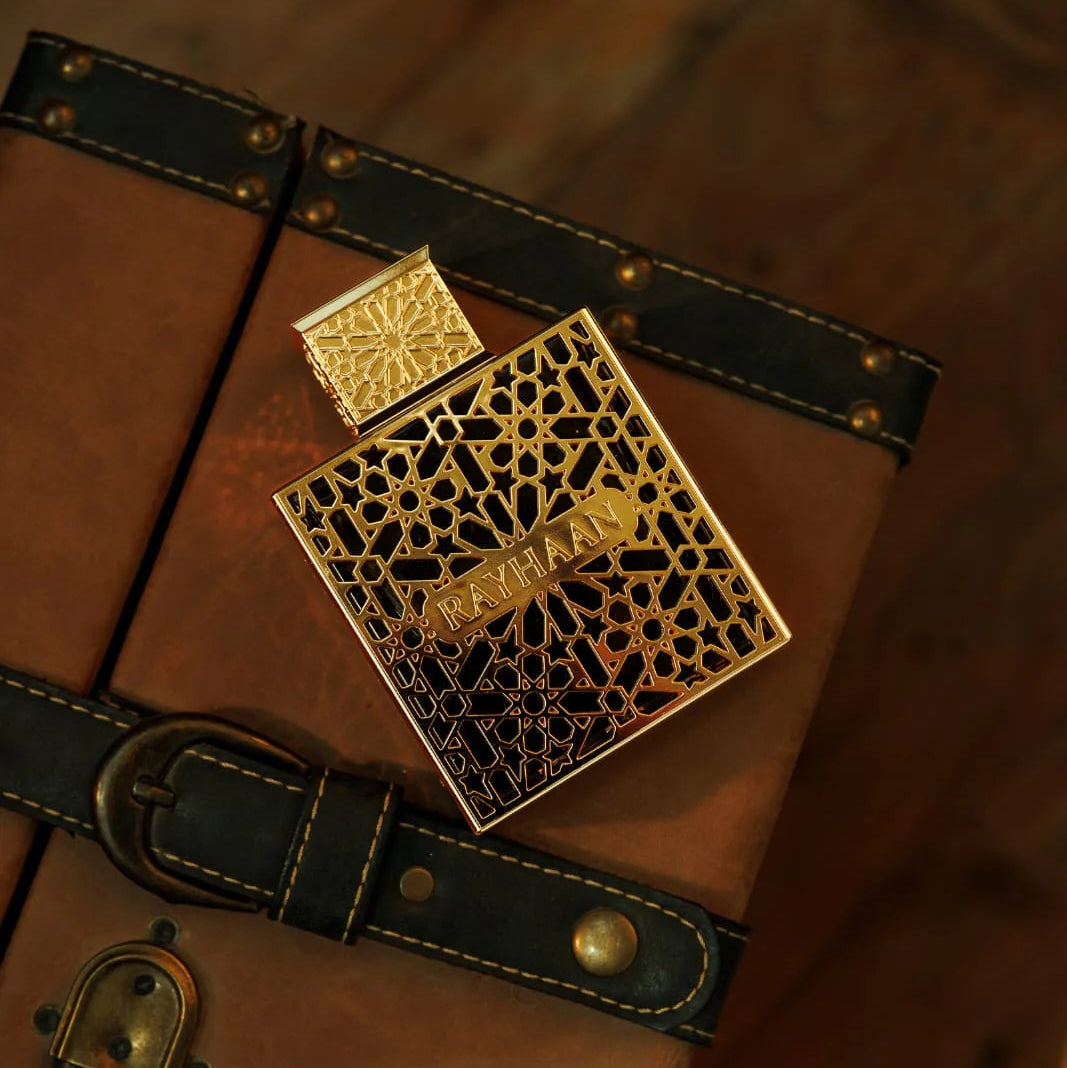 Decorative gold box on a wooden surface